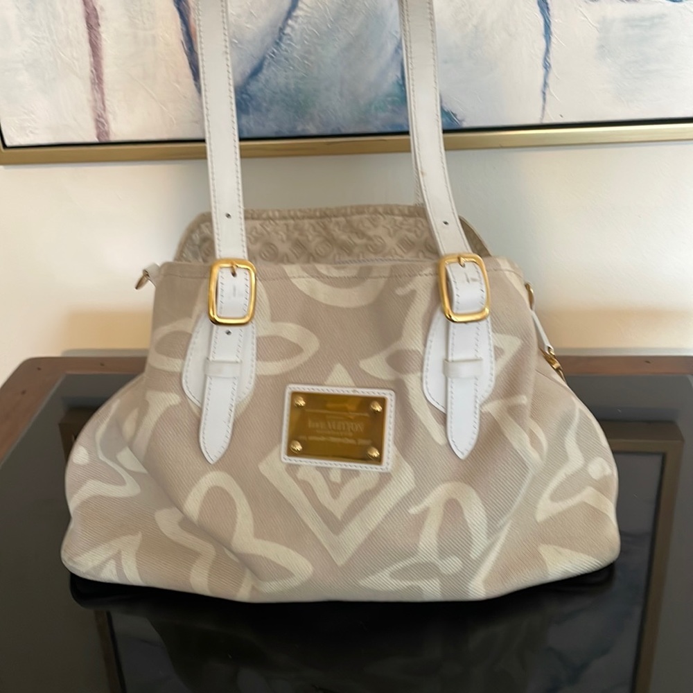 Cream and white canvas LV